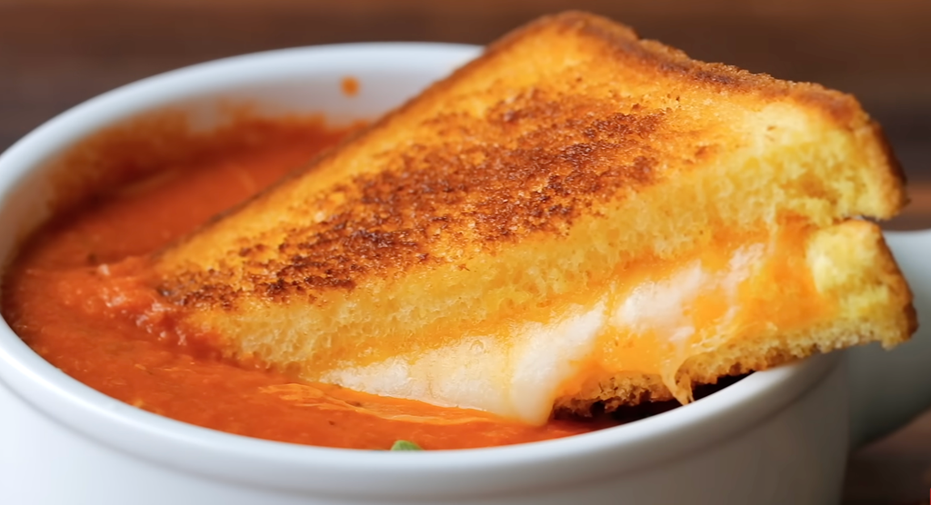 Classic grilled cheese sandwich with golden-brown toasted bread and gooey melted cheese, served hot for an easy lunch or cozy snack.