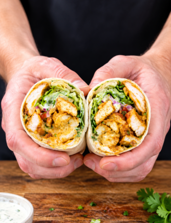 Crispy chicken wraps filled with shredded chicken, melted mozzarella and creamy white sauce